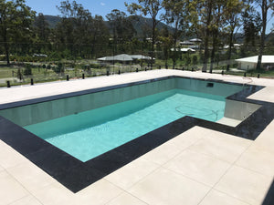Amic Pools latest swimming pool combined with the new Poolrite Composite Spigot for frameless glass fencing.